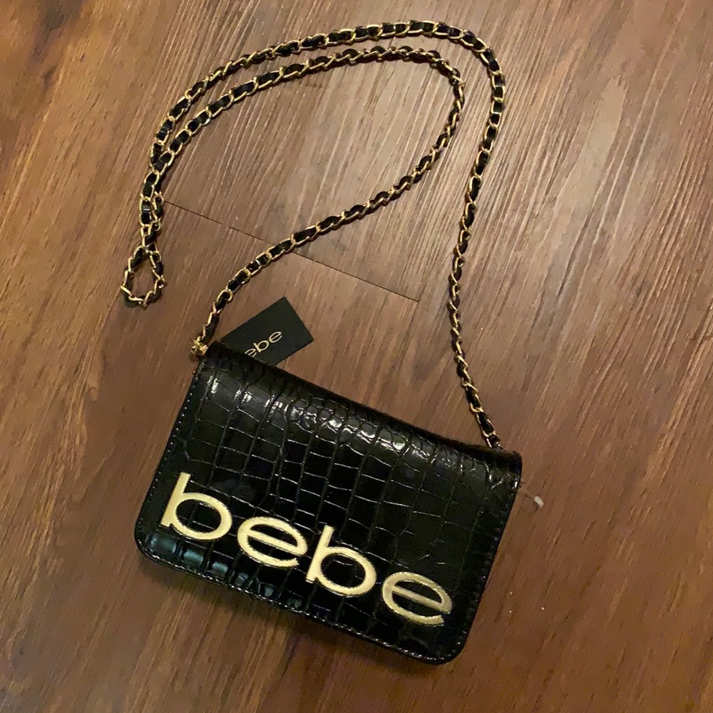 Bebe black and gold chain snakeskin pattern purse